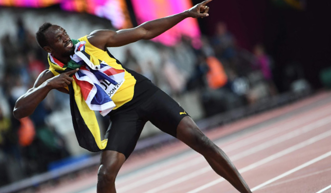 Jamaica's Usain Bolt performs his pose after winning the 100-meter final at  the world championships at the National Stadium in Beijing on Aug. 23,  2015. Two-time Olympic champion Bolt clocked 9.79 seconds