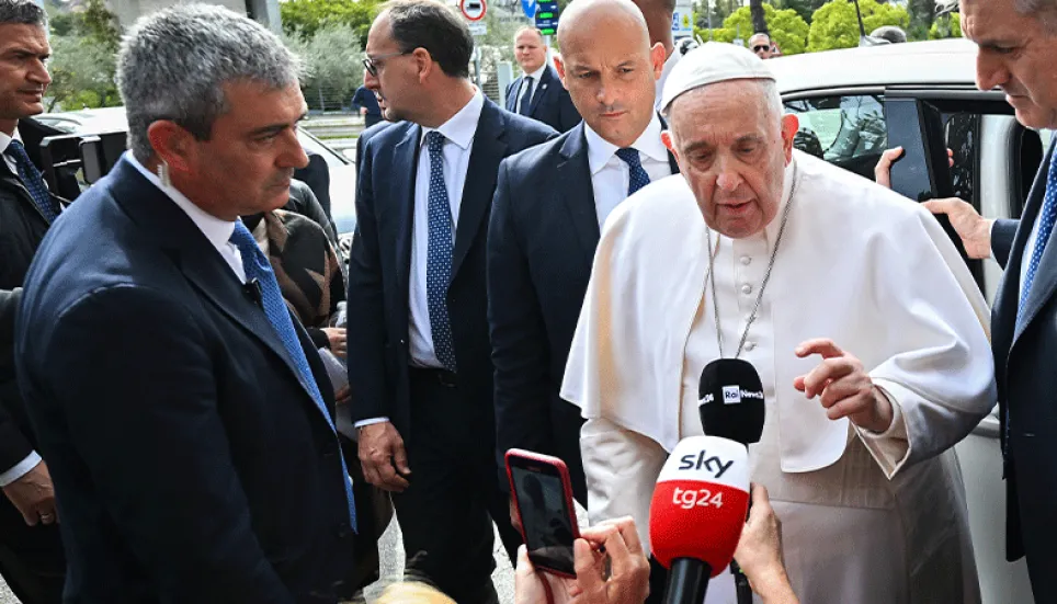 Pope Francis leaves hospital, quips 'I am still alive'