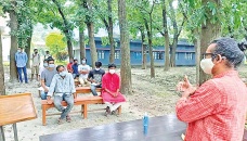 RU teacher takes class under tree protesting long closure 