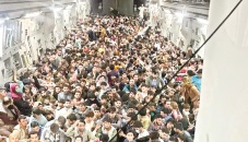 Over 600 Afghans cram into US cargo plane 