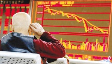 Stocks breathe relief after Evergrande bond deal 