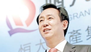 Evergrande’s billionaire boss exuded calm as crisis grew 