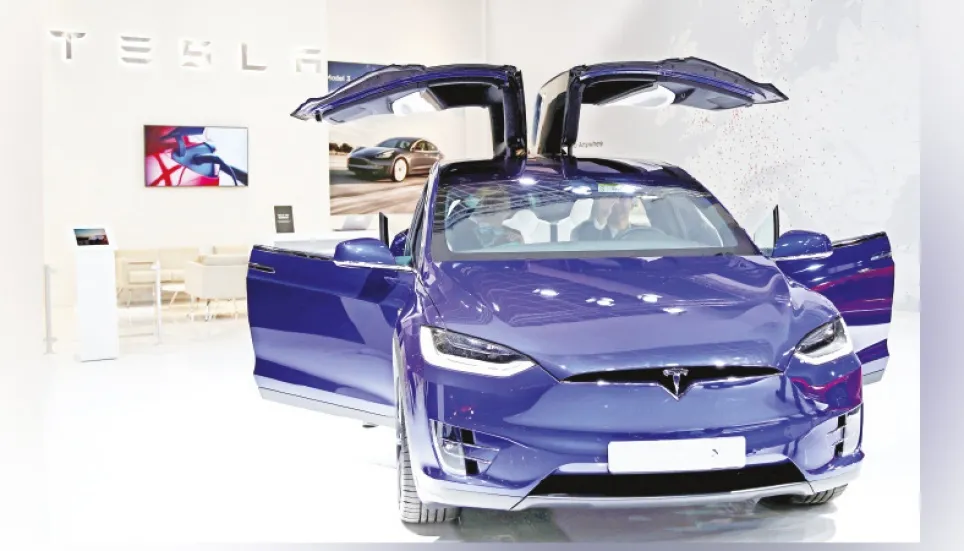 Tesla to post strong deliveries after production spurt 