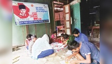 Students attend classes in verandas as Meghna washes away school