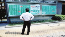 Asian markets struggle to track Wall Street rally 