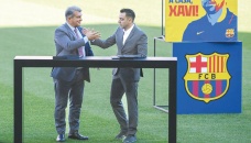 Xavi unveiled as Barca coach 