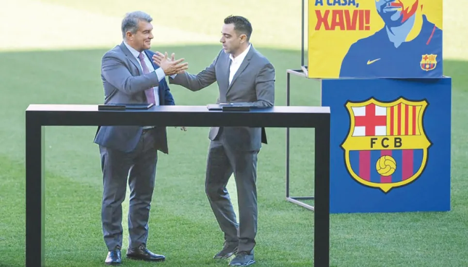 Xavi unveiled as Barca coach 