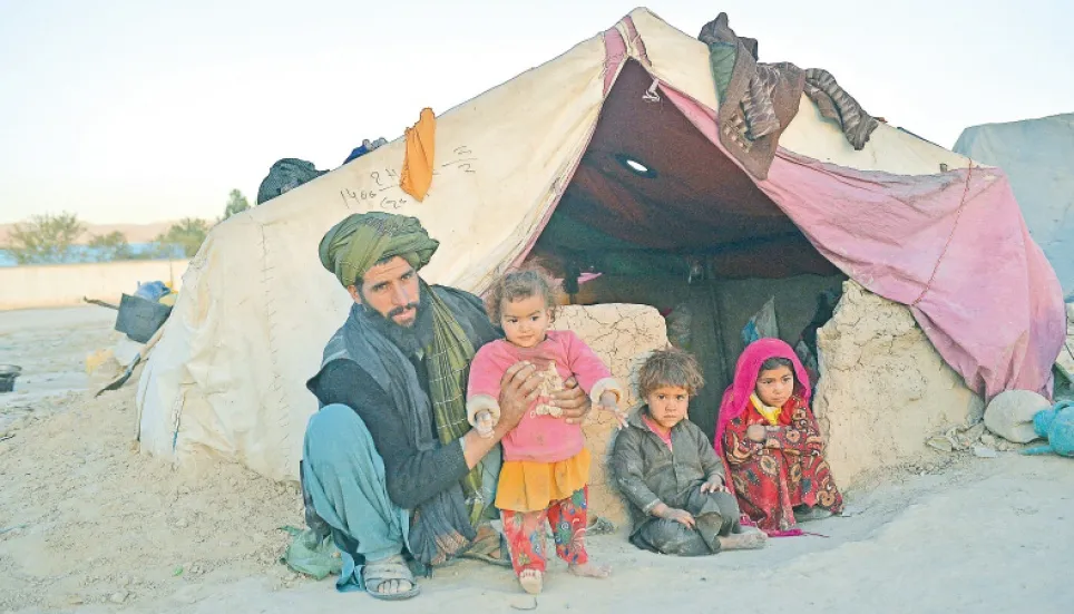 Afghans in war-scarred village struggle to rebuild homes 