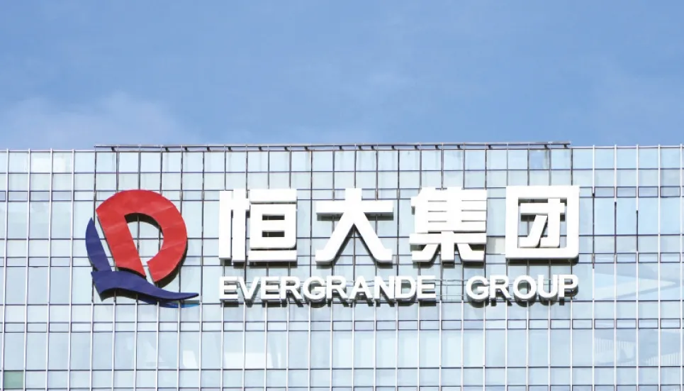 S&P dumps Evergrande into default 