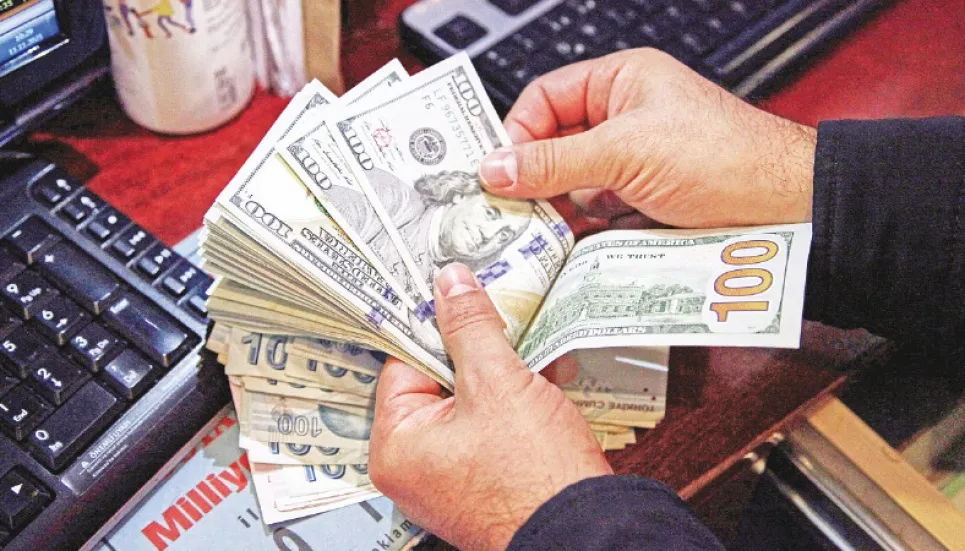 Dollar firms in soft holiday trading 