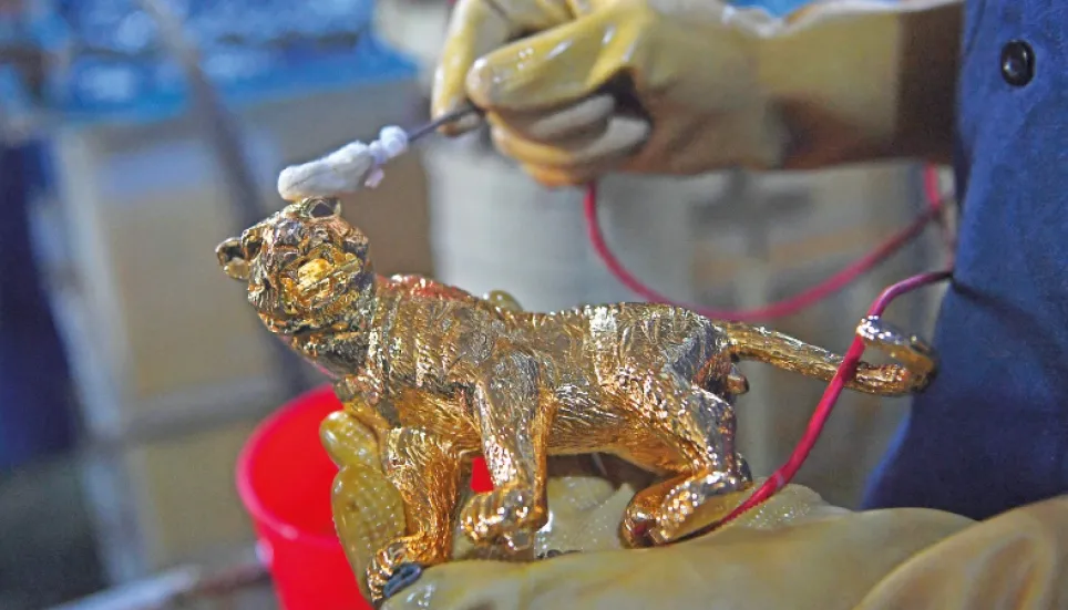 Burning bright: Vietnam’s gold-plated new year tiger 