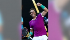 Nadal battles stomach pain to reach semis