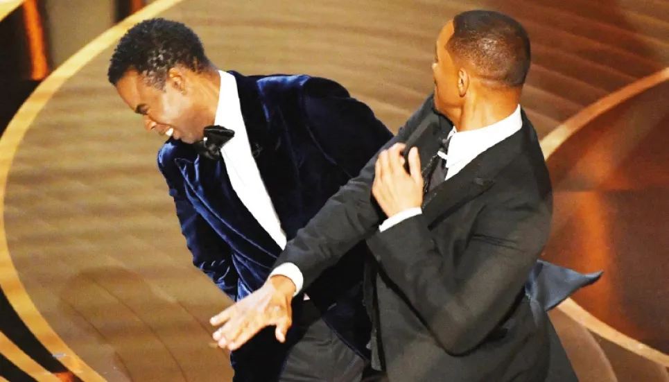 Will Smith slaps Chris Rock on Oscars stage 