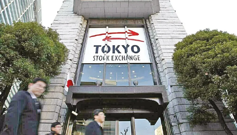 Tokyo shares close higher 