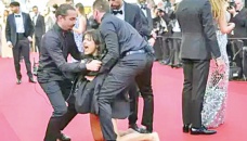 Woman removed from Cannes for protesting against sexual violence in Ukraine 