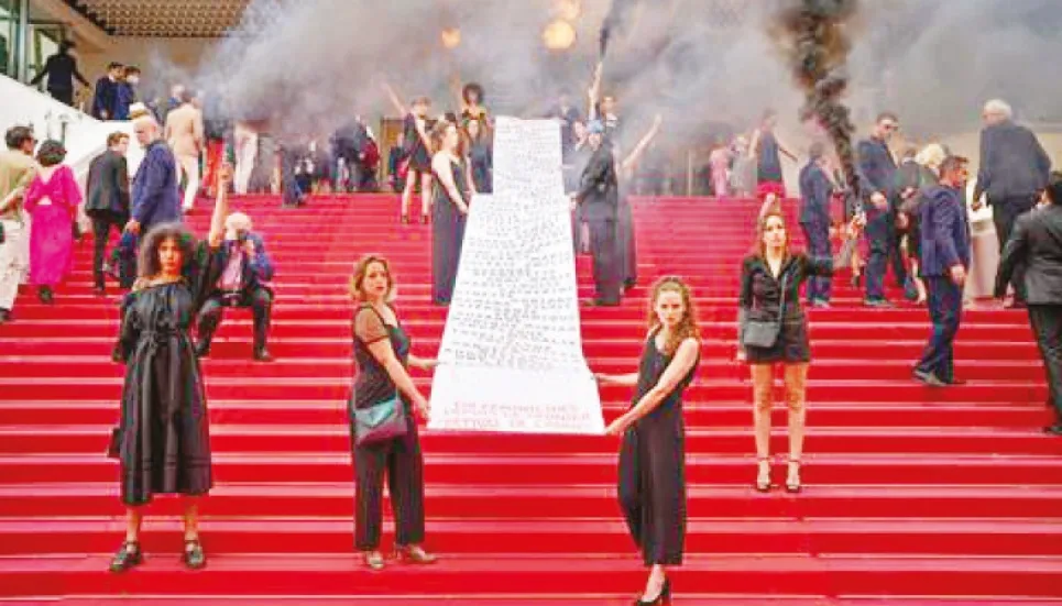 Protests invades Cannes red carpet to highlight violence against women 