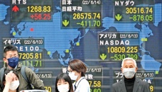 Tokyo stocks close higher after Fed hike 