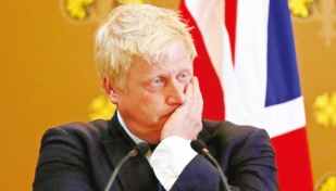 UK's Johnson in trouble over Daily Mail column