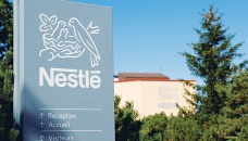 Nestle raises growth outlook, eyes consumer reaction to price hikes