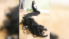US woman holds Guinness record for longest locks 
