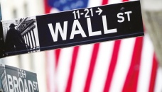 Wall Street closes higher despite tough Fed talk 