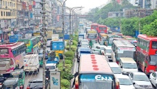 Commuters suffer on gridlocked Dhaka roads after rains