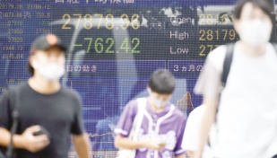 Asian markets drop as traders brace for key US inflation data 