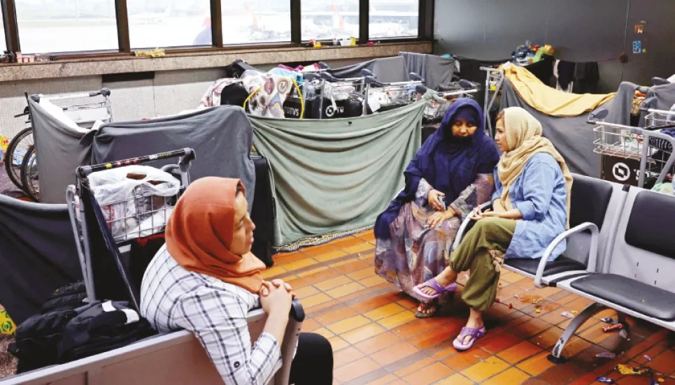 Afghan refugees camp out in Brazilian airport in search of new life 