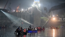 Arrests after India bridge collapse kills more than 130 