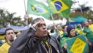 Brazilian protests intensify, Bolsonaro stays silent 