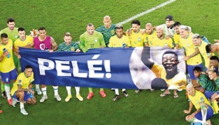 Pele watches Brazil World Cup match from hospital