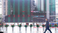Global shares stumble as China data stokes global economy fears