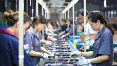 China factory output rebounds on zero-Covid relaxation