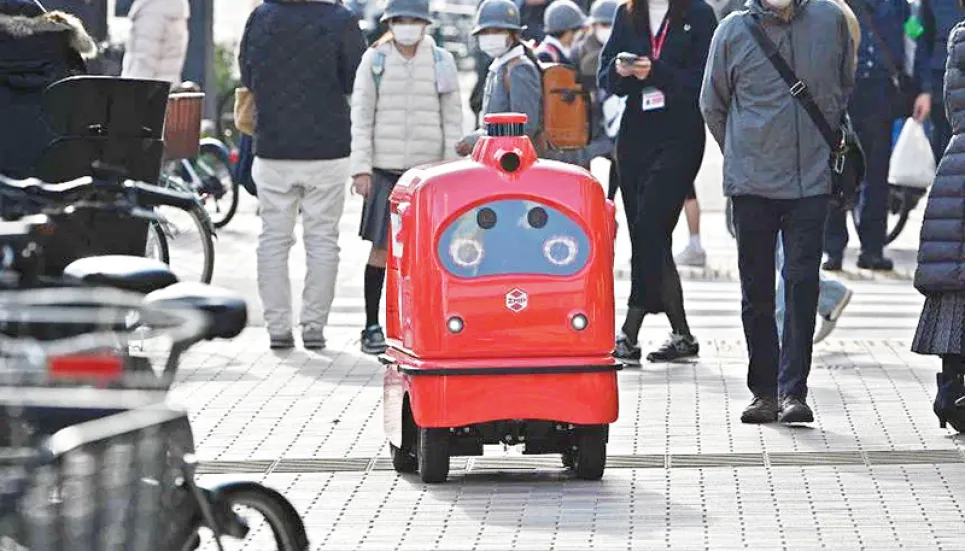 Japan rolls out humble and lovable delivery robots