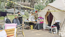 Barber tidies up in Turkey quake tent camp