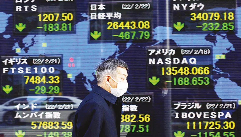 Asian markets mostly rise as US data boosts rate hopes