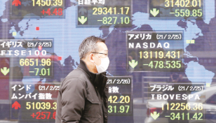 Asian stocks mixed ahead of tech earnings results