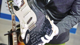 Guitar smashed by Kurt Cobain sells for $600k