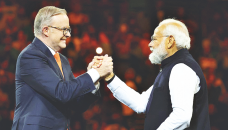 Australia fetes Modi with focus on trade, not rights