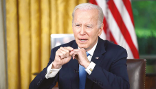 Biden signs debt ceiling bill into law, averting default