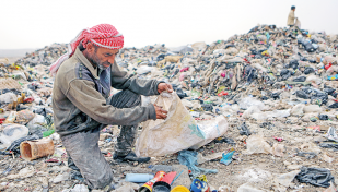 Syrians turn plastic waste into rugs to make a living