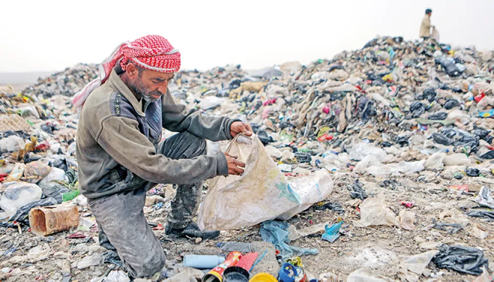 Syrians turn plastic waste into rugs to make a living