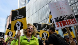 Hollywood writers, studios reach tentative deal to end strike