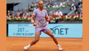 Nadal keeps his clay dream alive as he battles past Cachin