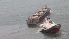 Ship sailing under Panama flag runs aground in northern Japan, oil leaking