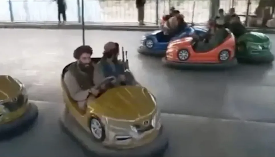 Videos show armed Taliban soldiers enjoying Kabul amusement park rides