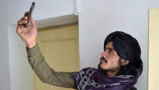 Social media giants grapple with Taliban dilemma