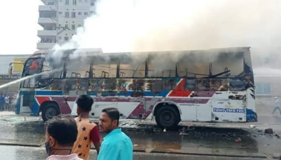 RMG workers torch bus, block Dhaka-M'singh Highway