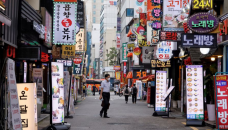 South Korea to reimpose business curfews to battle Covid surge