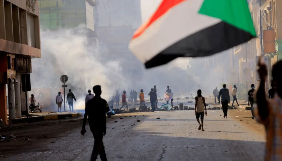 Sudan forces fire tear gas as protesters head to presidential palace